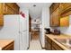 Full view of condo kitchen with appliances and cabinets at 9621 Shore Dr. # B-112, Myrtle Beach, SC 29572
