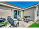 Enjoy outdoor relaxation on the patio with chairs and a grill at 9650 Bradford Ln., Murrells Inlet, SC 29576