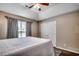 Bedroom featuring a tray ceiling and a spacious closet at 9650 Bradford Ln., Murrells Inlet, SC 29576