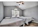 Comfortable bedroom featuring two twin beds and a window at 9650 Bradford Ln., Murrells Inlet, SC 29576