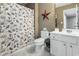 Clean bathroom with white vanity and nautical-themed shower curtain at 100 Machrie Loop # 17-C, Myrtle Beach, SC 29588