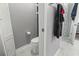 Small bathroom with toilet and marble floors at 100 Machrie Loop # 17-C, Myrtle Beach, SC 29588
