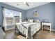 Bright bedroom with beach decor and hardwood floors at 100 Machrie Loop # 17-C, Myrtle Beach, SC 29588