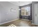 Bright dining room with hardwood floors and neutral walls at 100 Machrie Loop # 17-C, Myrtle Beach, SC 29588
