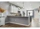 Kitchen with breakfast bar, white cabinets, and granite countertops at 100 Machrie Loop # 17-C, Myrtle Beach, SC 29588