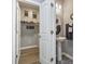 Convenient laundry room with washer, dryer, and storage shelves at 100 Machrie Loop # 17-C, Myrtle Beach, SC 29588