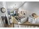 Spacious living room with access to a patio and high ceilings at 100 Machrie Loop # 17-C, Myrtle Beach, SC 29588