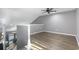 Spacious loft area with hardwood floors and ceiling fan at 100 Machrie Loop # 17-C, Myrtle Beach, SC 29588