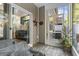 Screened porch with sliding glass doors and patio furniture at 100 Machrie Loop # 17-C, Myrtle Beach, SC 29588