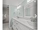 Elegant bathroom with double vanity and marble countertops at 100 Ocean Creek Blvd. # J1, Myrtle Beach, SC 29572