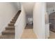 Inviting entryway with tile flooring, staircase, and a view into the spacious living area at 1025 Carolina Rd. # Y-1, Conway, SC 29526