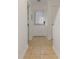Well-lit hallway with tile flooring and access to the kitchen and other rooms at 1025 Carolina Rd. # Y-1, Conway, SC 29526