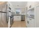 Updated kitchen features stainless steel appliances, granite countertops, and white cabinetry at 1025 Carolina Rd. # Y-1, Conway, SC 29526