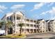 Three-story building with multiple units and parking at 1058 Sea Mountain Hwy. # 7-302, North Myrtle Beach, SC 29582