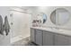 Bathroom boasts double vanity sinks and a shower at 124 Golden Bear Circle, Longs, SC 29568