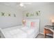Serene bedroom featuring a white sleigh bed and soft decor at 124 Golden Bear Circle, Longs, SC 29568