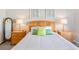 Simple bedroom with wood bed frame and nightstands at 124 Golden Bear Circle, Longs, SC 29568