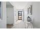 Bright entryway with white walls and wood floors at 124 Golden Bear Circle, Longs, SC 29568