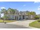 Beautiful two-story home featuring a three-car garage, well-manicured lawn, and a spacious driveway at 1422 Bohicket Ct., Myrtle Beach, SC 29579