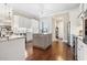 Bright kitchen featuring stainless steel appliances, light gray cabinets, and a gray kitchen island at 1422 Bohicket Ct., Myrtle Beach, SC 29579