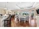 Expansive living room with seamless flow to kitchen and patio, offering ample space for entertaining and relaxation at 1422 Bohicket Ct., Myrtle Beach, SC 29579
