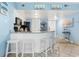 Bright kitchen with granite counters, white cabinets and breakfast bar at 1605 S Ocean Blvd. # 414, Myrtle Beach, SC 29577