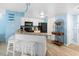 Kitchen with granite countertop, black appliances, and white cabinets at 1605 S Ocean Blvd. # 414, Myrtle Beach, SC 29577
