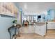 Open kitchen features granite counters and black appliances at 1605 S Ocean Blvd. # 414, Myrtle Beach, SC 29577