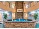 Elegant lobby with stone fountain and tropical plants at 1605 S Ocean Blvd. # 414, Myrtle Beach, SC 29577
