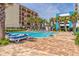 Resort-style pool with surrounding lounge chairs at 1605 S Ocean Blvd. # 414, Myrtle Beach, SC 29577