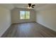 Bright bedroom with hardwood flooring and a large window at 1718 26Th Ave. N, North Myrtle Beach, SC 29582