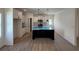 Elegant kitchen with custom cabinets, stainless steel appliances, and a dark-colored island at 1718 26Th Ave. N, North Myrtle Beach, SC 29582
