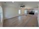 Bright living area with hardwood floors and crown molding, connecting to a kitchen at 1718 26Th Ave. N, North Myrtle Beach, SC 29582