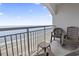 Balcony with ocean view and two chairs at 2000 N Ocean Blvd. # Ph 3, Myrtle Beach, SC 29577