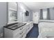 White dresser with granite top, twin beds in bedroom at 2000 N Ocean Blvd. # Ph 3, Myrtle Beach, SC 29577