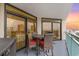 Balcony with table and chairs, offering an ocean view at 205 74Th Ave. N # 709, Myrtle Beach, SC 29572