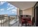 Balcony with table and chairs, offering an ocean view at 205 74Th Ave. N # 709, Myrtle Beach, SC 29572