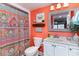 Coral-themed bathroom with white vanity and shower at 205 74Th Ave. N # 709, Myrtle Beach, SC 29572