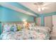 Bedroom with two twin beds, coastal decor and ceiling fan at 205 74Th Ave. N # 709, Myrtle Beach, SC 29572