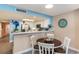 Kitchen with breakfast bar and stainless steel appliances at 205 74Th Ave. N # 709, Myrtle Beach, SC 29572