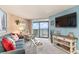 Living room with ocean view, comfy seating, and coastal decor at 205 74Th Ave. N # 709, Myrtle Beach, SC 29572