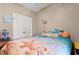 Bedroom featuring nautical-themed bedding, closet, and fun decor on top of a wooden cabinet at 2080 Cross Gate Blvd. # 303, Surfside Beach, SC 29575