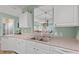 Efficient kitchen with white cabinetry, a double sink, and a pass-through to the living area at 2080 Cross Gate Blvd. # 303, Surfside Beach, SC 29575