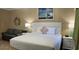 Bedroom offers a queen bed, seating area, and nautical themed decor at 241 Presidential Dr., Surfside Beach, SC 29575
