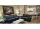 A combined living and dining area with sofas, a dining table, and a view into the kitchen at 241 Presidential Dr., Surfside Beach, SC 29575