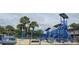 Community playground with slides and play areas in the backyard at 241 Presidential Dr., Surfside Beach, SC 29575