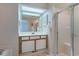 Bathroom features a vanity with sink, shower, and a large mirror at 25 Frigate Ct., Pawleys Island, SC 29585