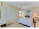 Bright bedroom with a queen-size bed, double closets and ceiling fan at 25 Frigate Ct., Pawleys Island, SC 29585