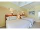 Bedroom with two twin beds, ceiling fan and access to a private deck at 25 Frigate Ct., Pawleys Island, SC 29585