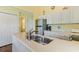 Kitchen with stainless steel sink and appliances at 25 Frigate Ct., Pawleys Island, SC 29585